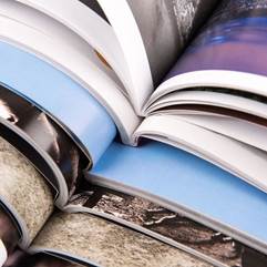 Close up of a stack of books

AI-generated content may be incorrect.