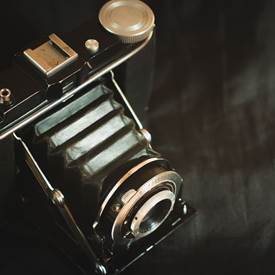 A close up of a camera

AI-generated content may be incorrect.