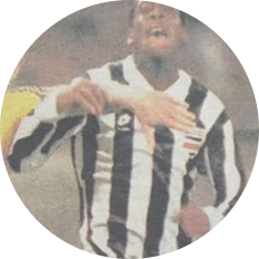 A person in a black and white striped shirt

AI-generated content may be incorrect.